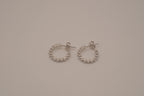 Sterling silver hoop earrings with sparking stones