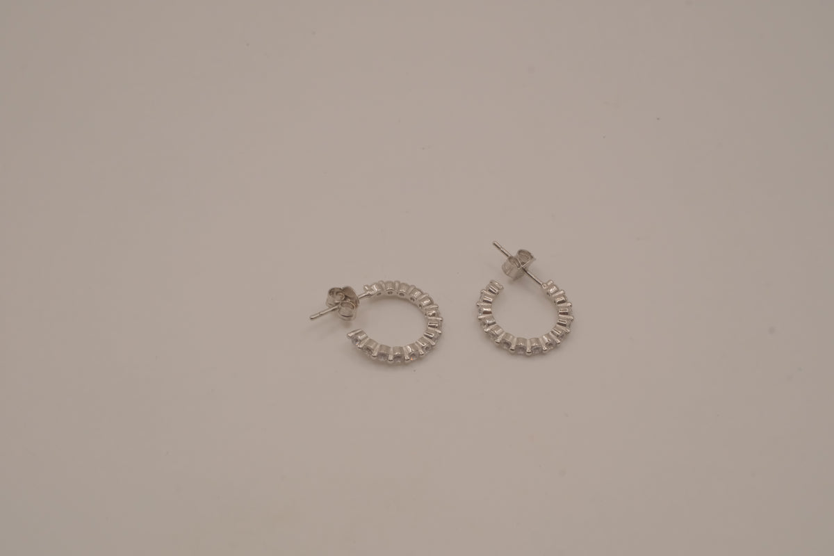 Sterling silver hoop earrings with sparking stones