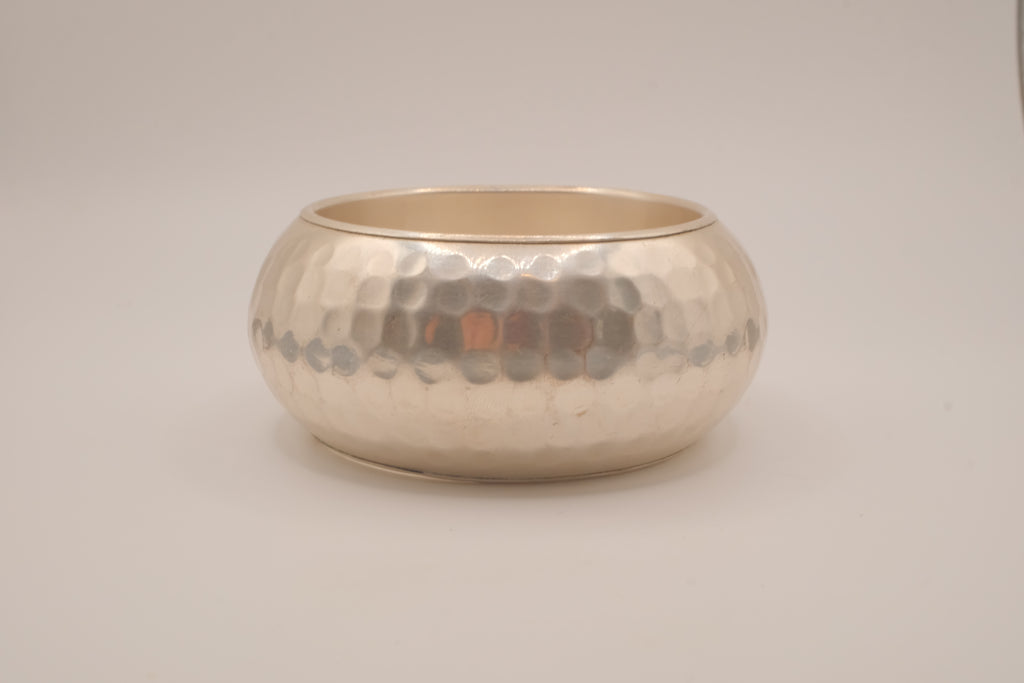 Wide, hammered silver-tone bangle bracelet