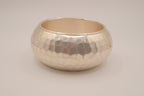 Wide, hammered silver-tone bangle bracelet