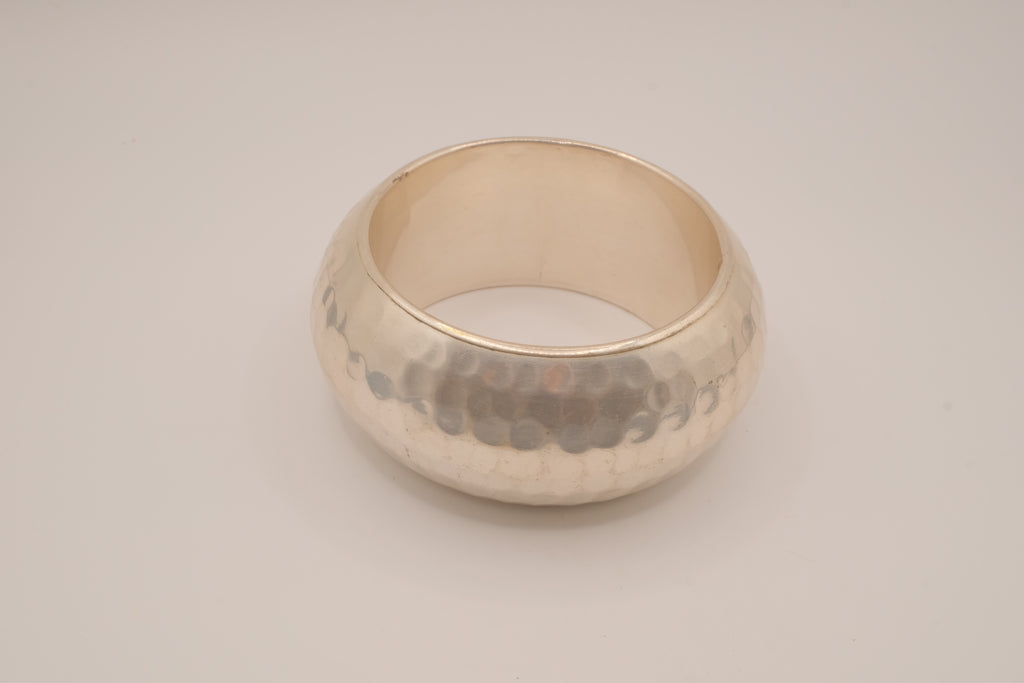 Wide, hammered silver-tone bangle bracelet