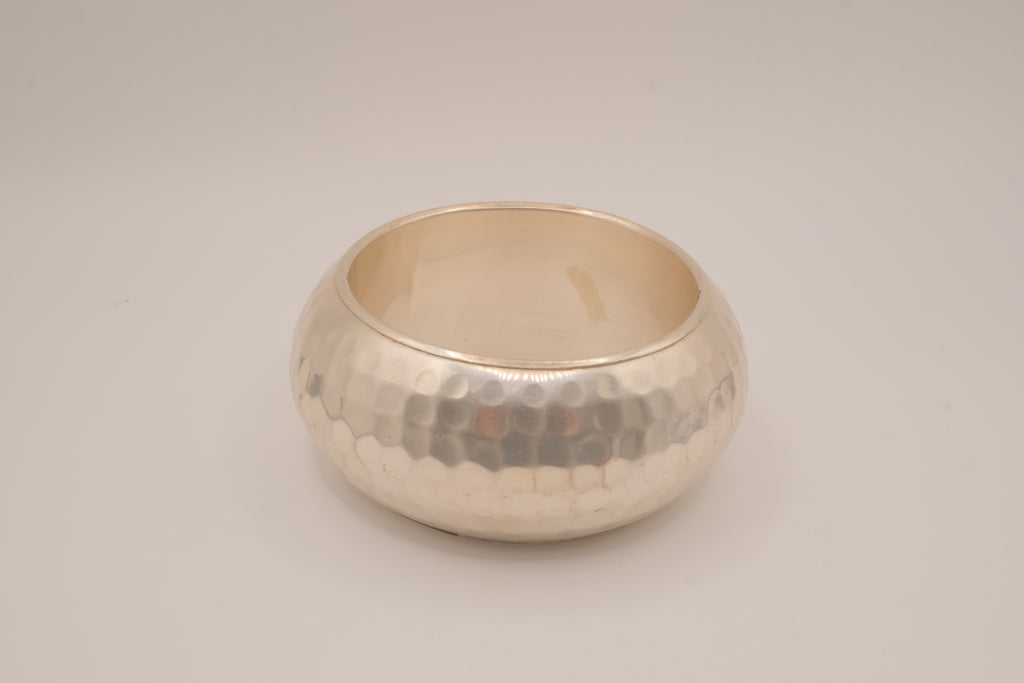 Wide, hammered silver-tone bangle bracelet