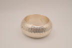 Wide, hammered silver-tone bangle bracelet