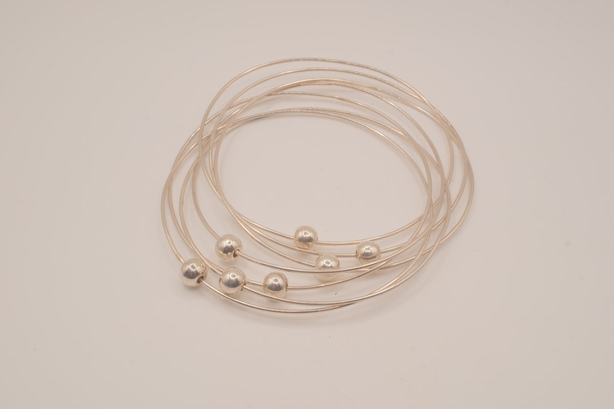 Sterling silver interlocking stack bangle