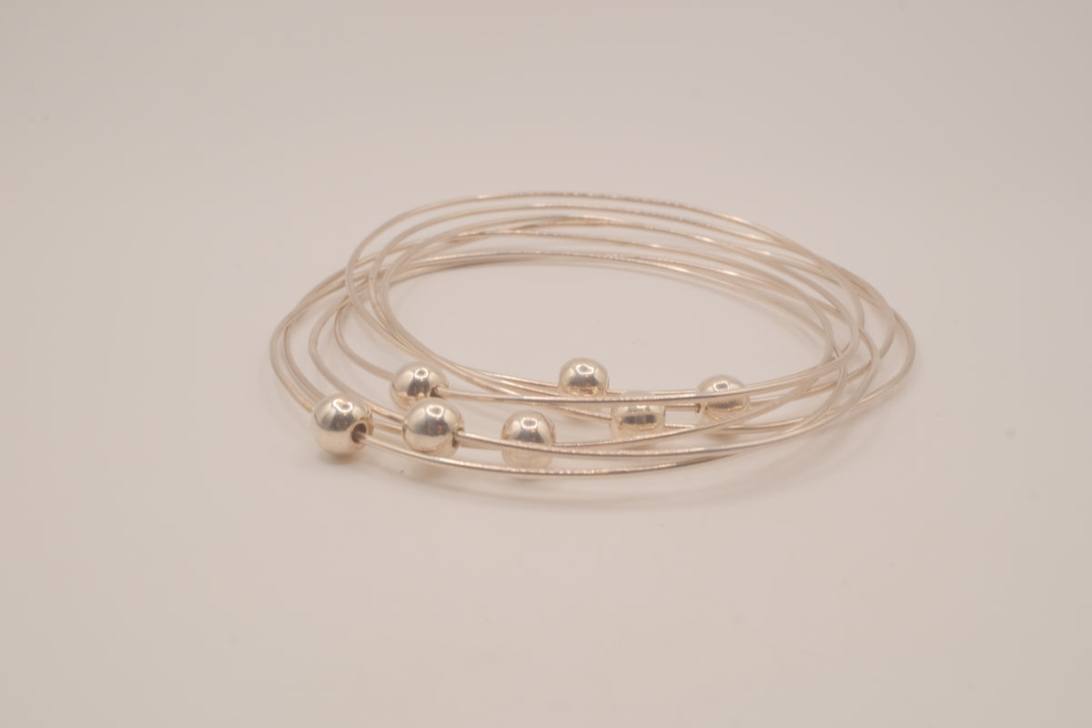 Sterling silver interlocking stack bangle