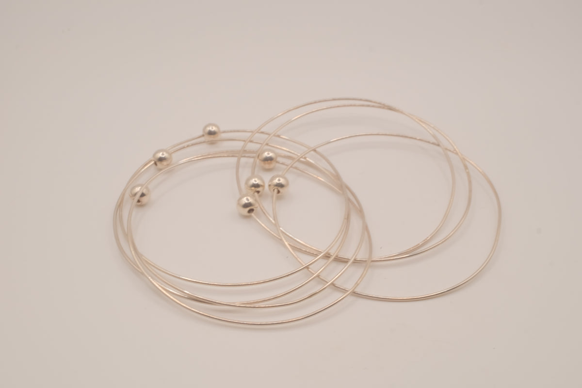 Sterling silver interlocking stack bangle