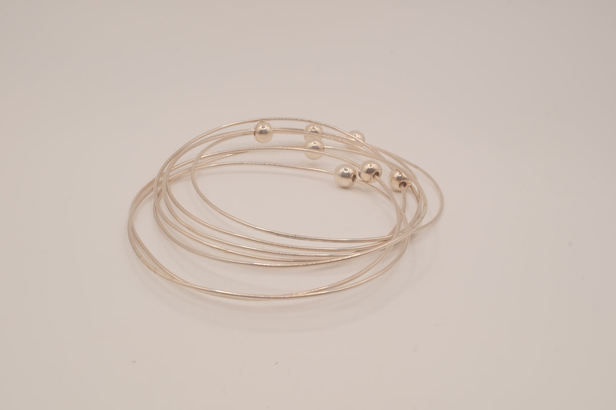 Sterling silver interlocking stack bangle