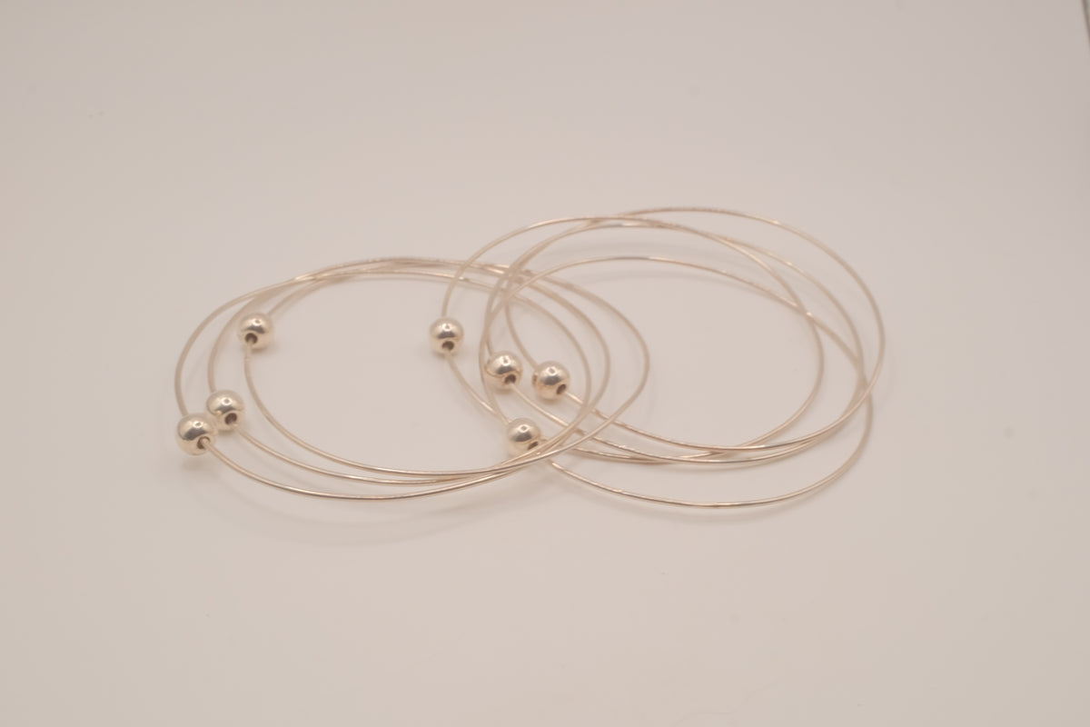 Sterling silver interlocking stack bangle
