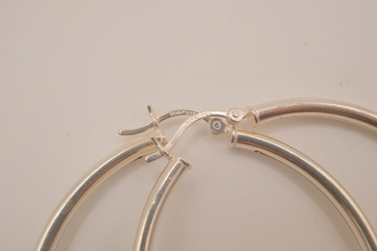 Sterling silver sleek hoop earrings