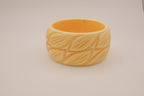 Vintage deeply carved Bakelite bangle bracelet