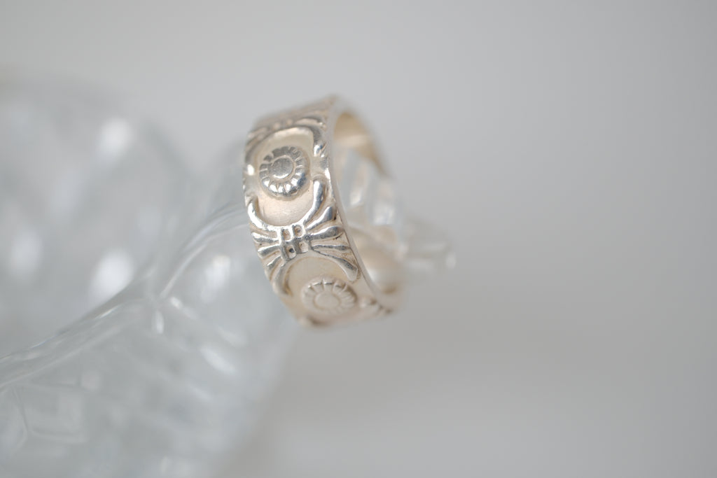 Sterling silver repoussé band ring