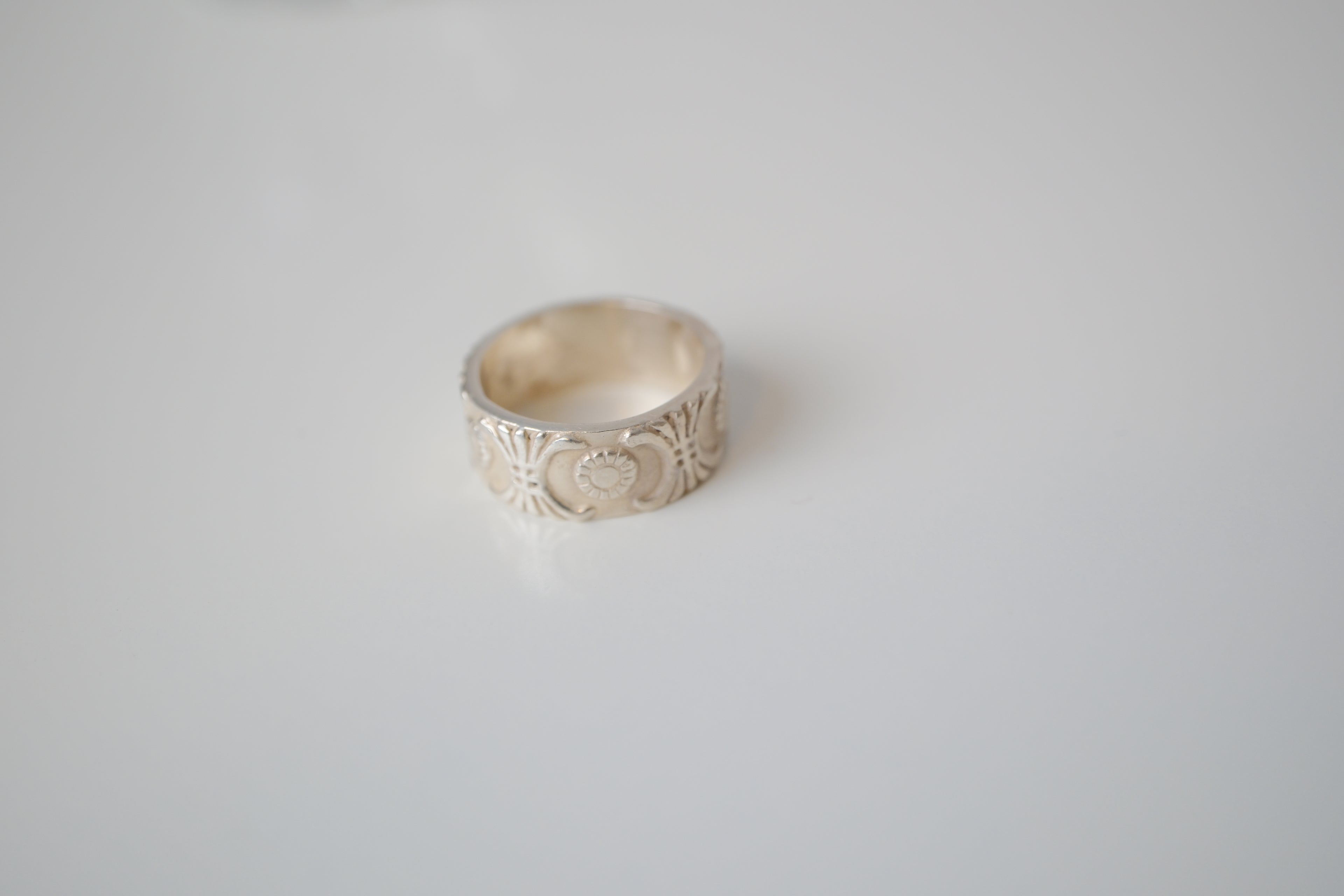 Sterling silver repoussé band ring