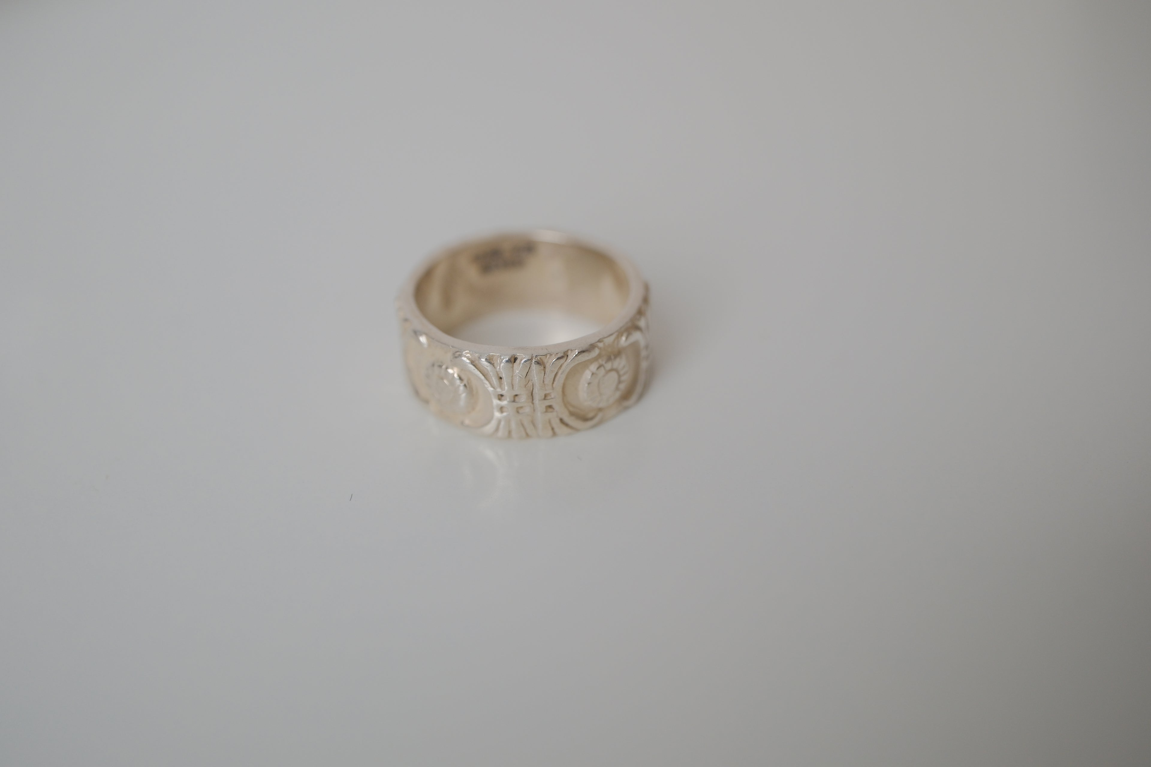 Sterling silver repoussé band ring