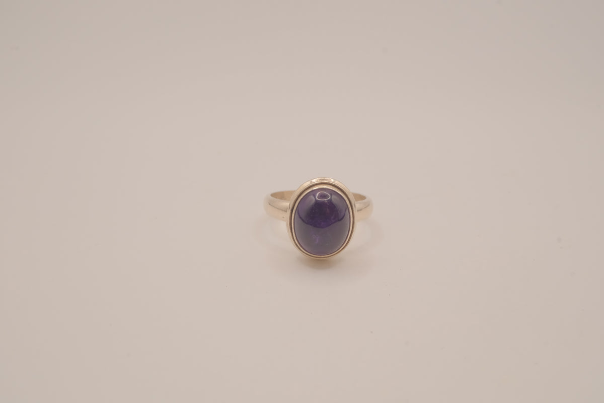 Sterling silver oval amethyst cabochon ring