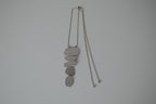 Cascading silver tone necklace