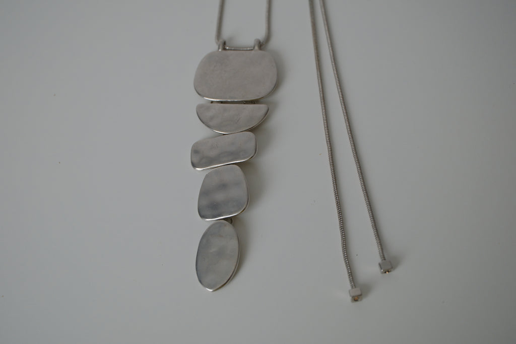 Cascading silver tone necklace
