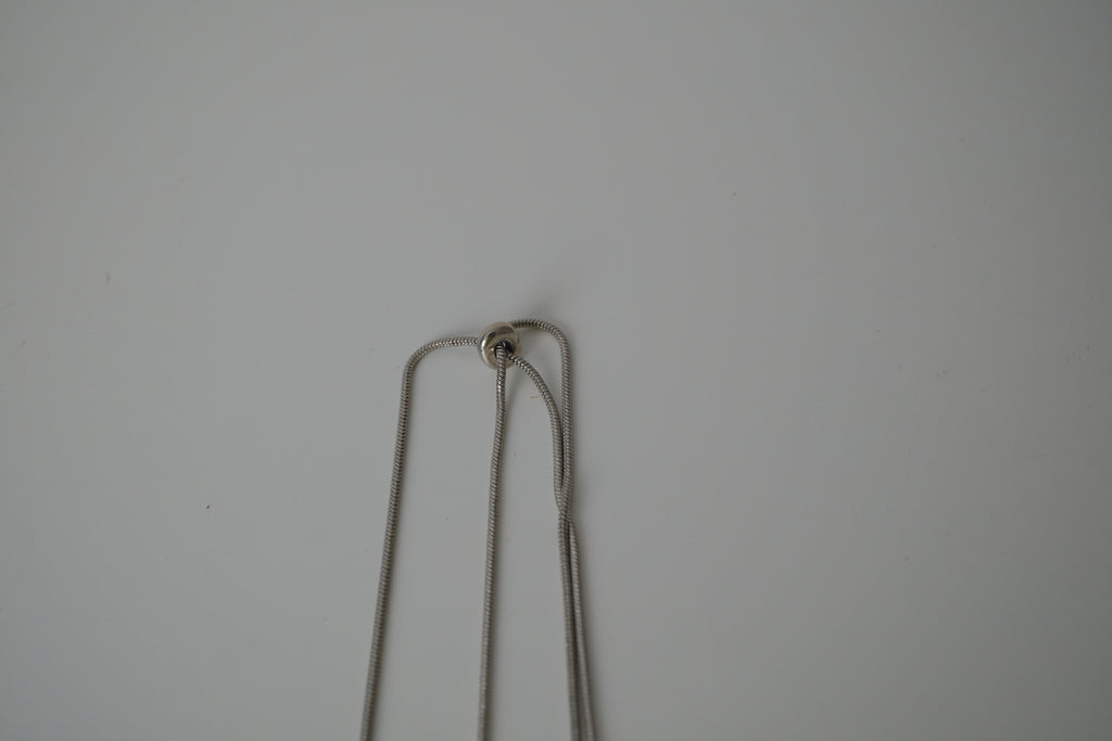 Cascading silver tone necklace