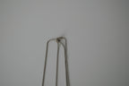 Cascading silver tone necklace