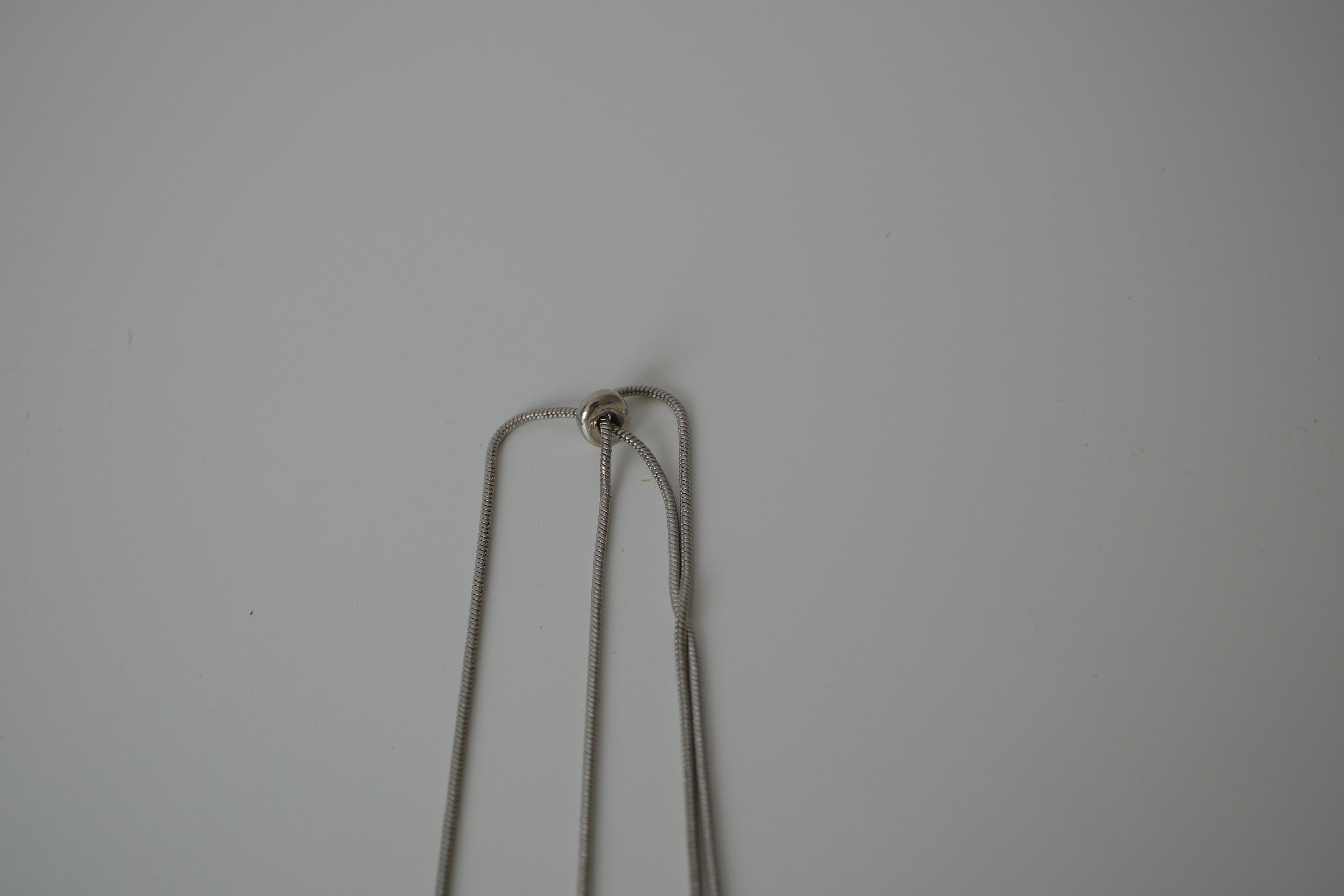 Cascading silver tone necklace