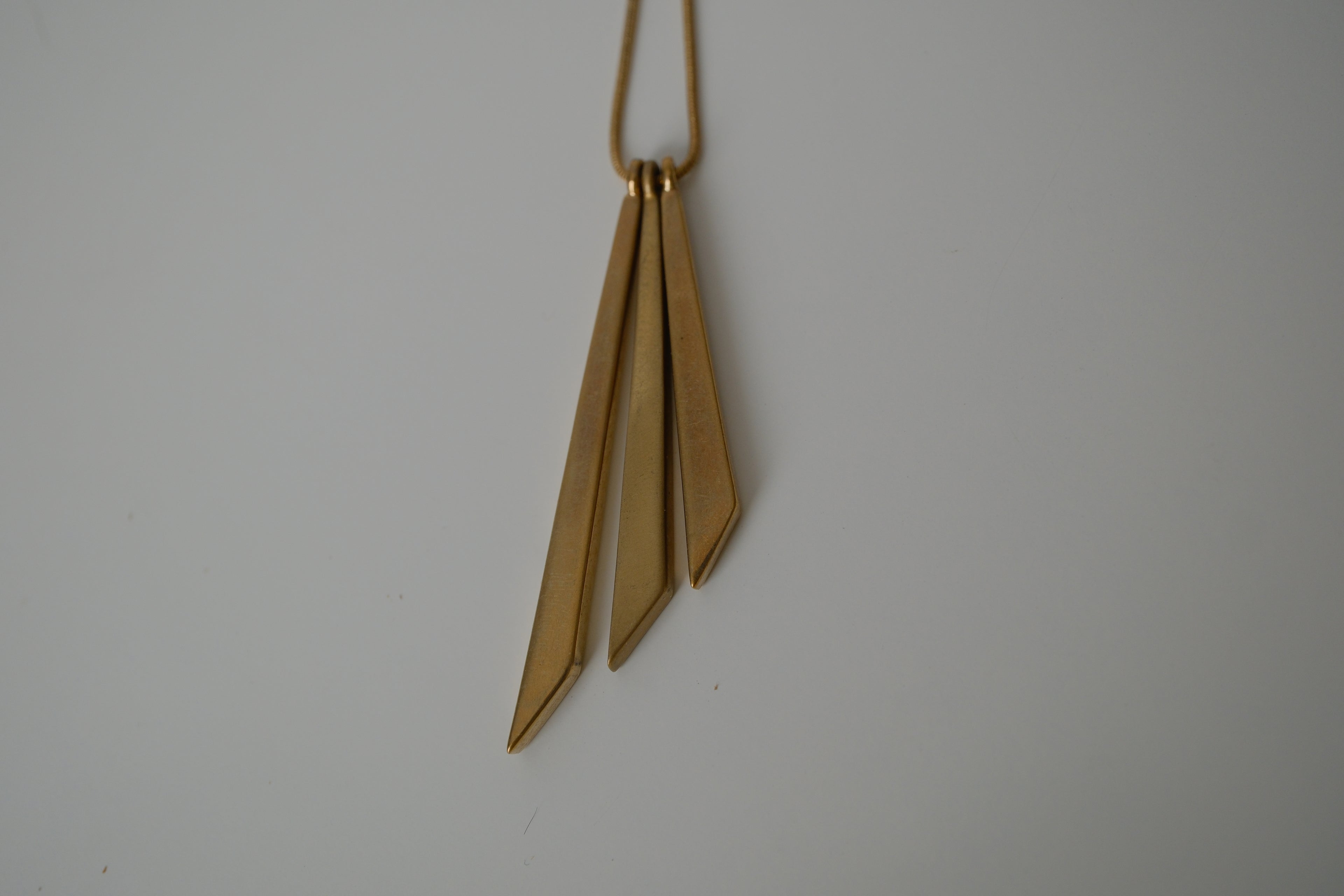 Asymmetric, tiered pendant necklace