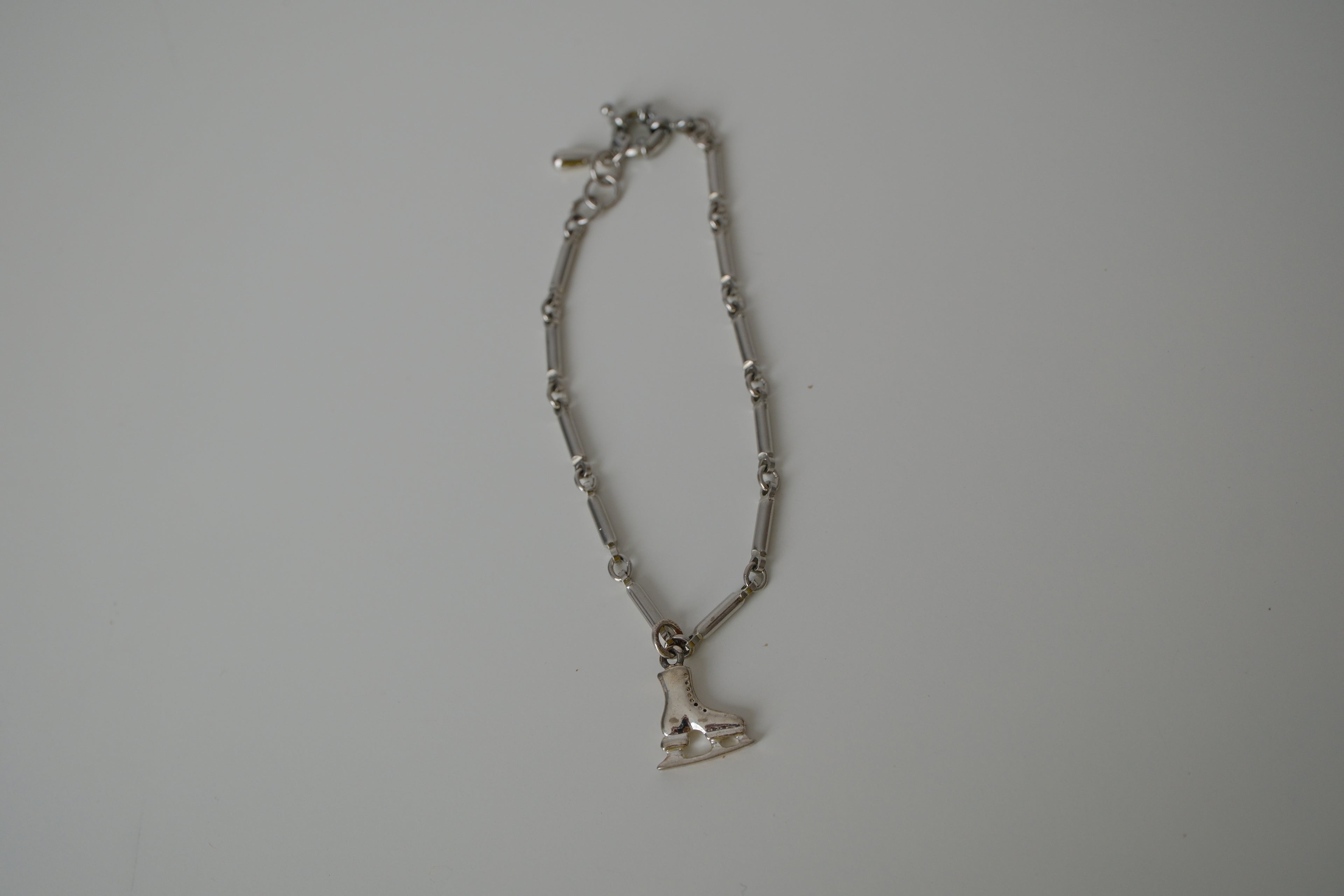 Reworked ice skate charm bracelet