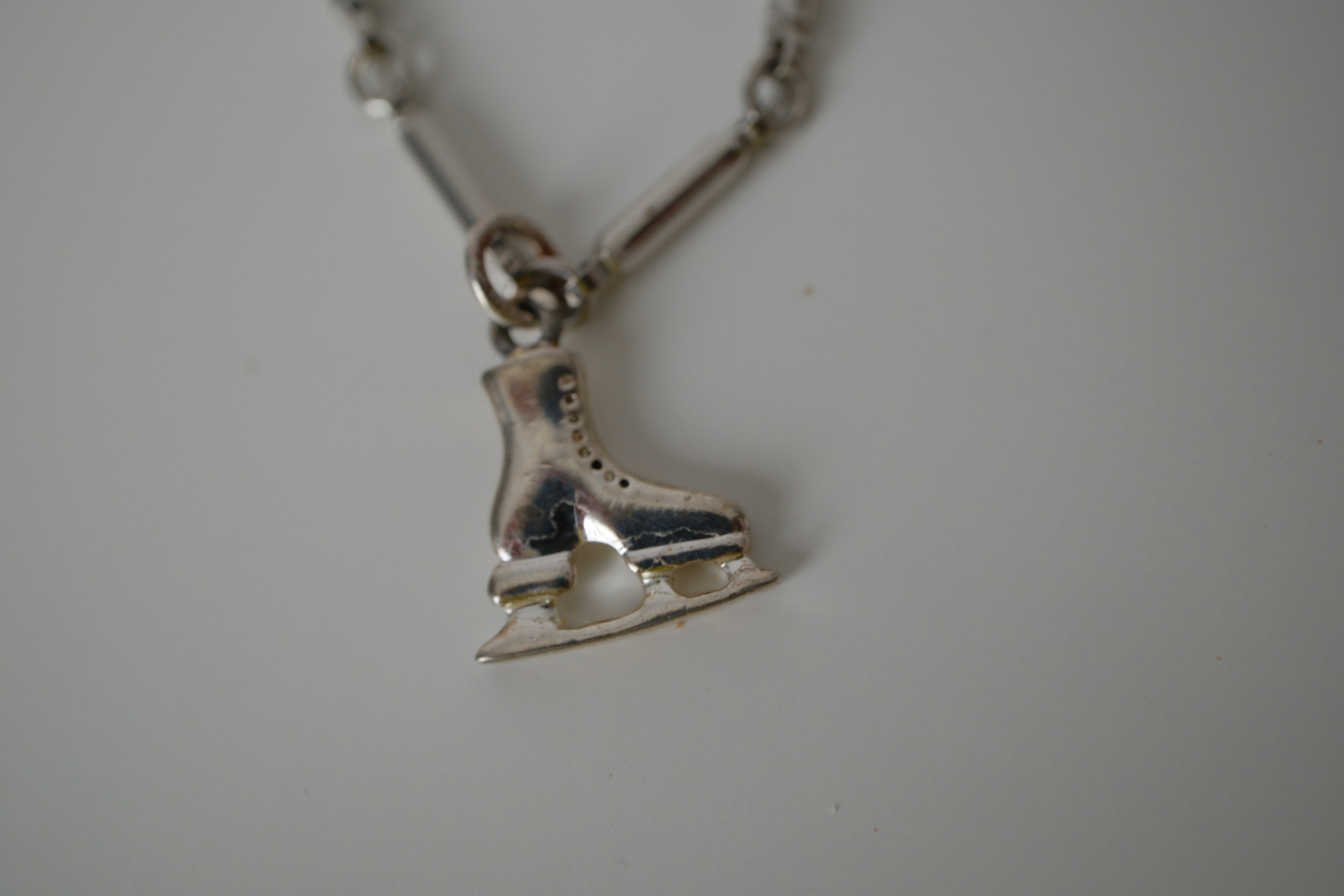 Reworked ice skate charm bracelet