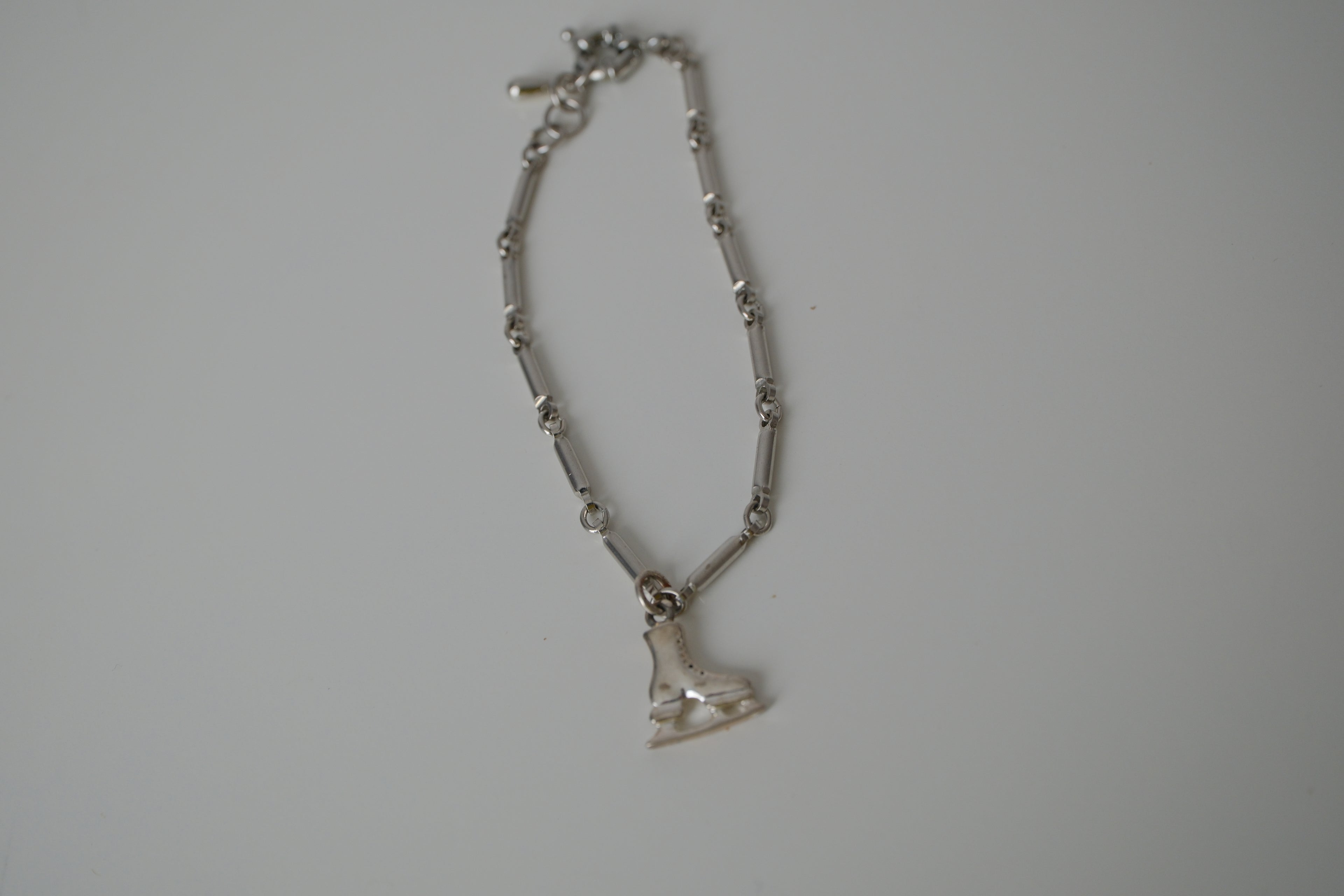 Reworked ice skate charm bracelet