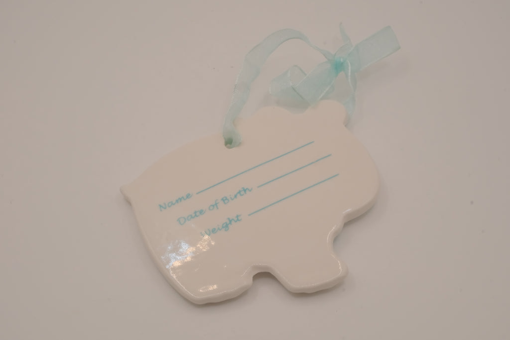 Vintage Avon glossy white ceramic bear ornament