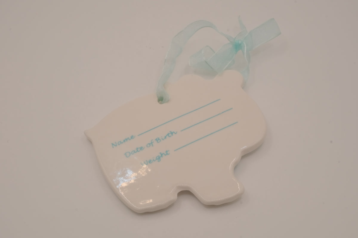 Vintage Avon glossy white ceramic bear ornament