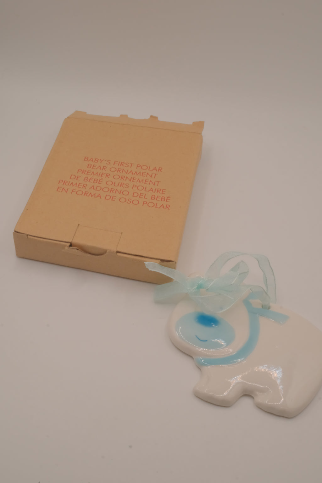 Vintage Avon glossy white ceramic bear ornament