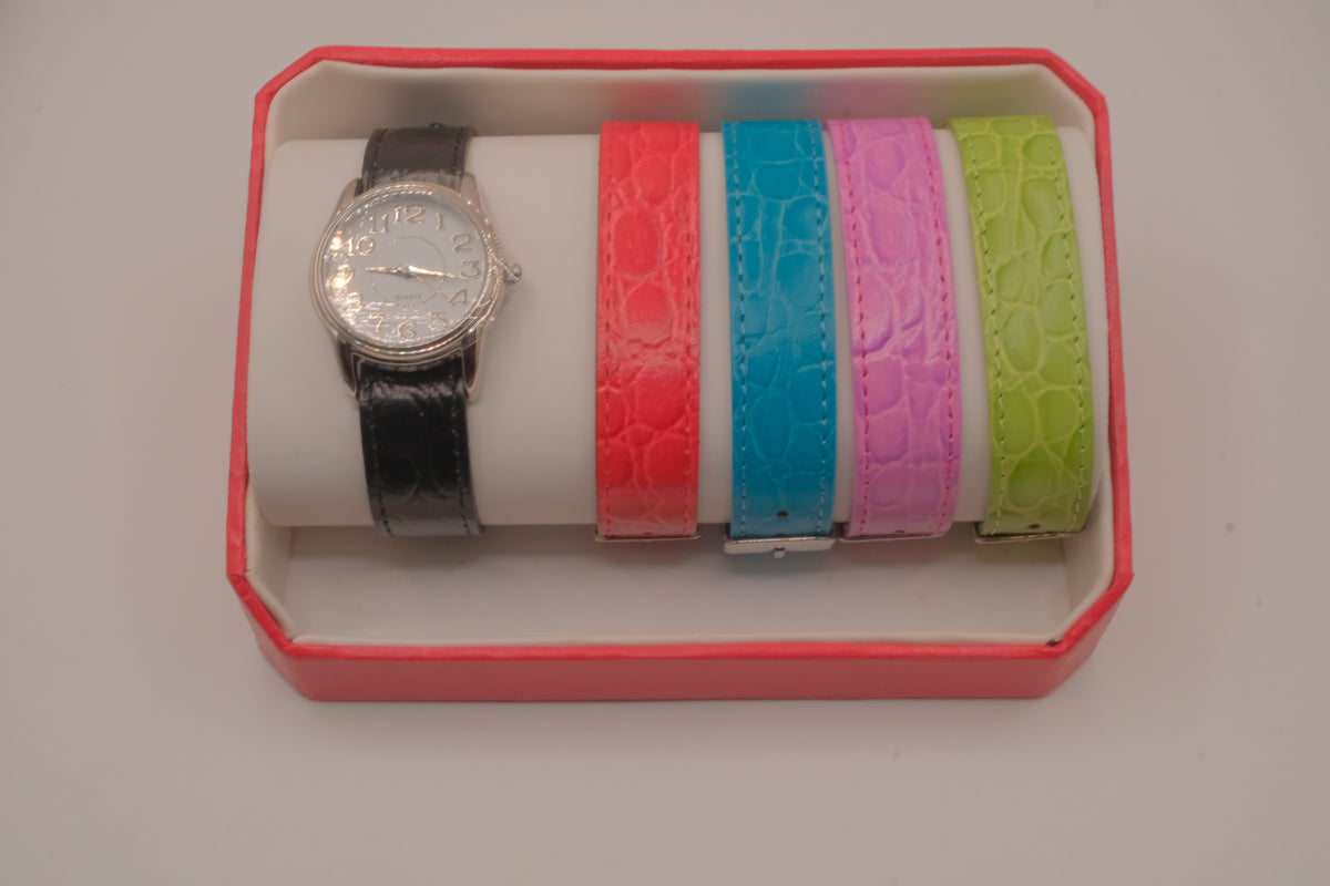 Vintage Avon interchangeable watch set