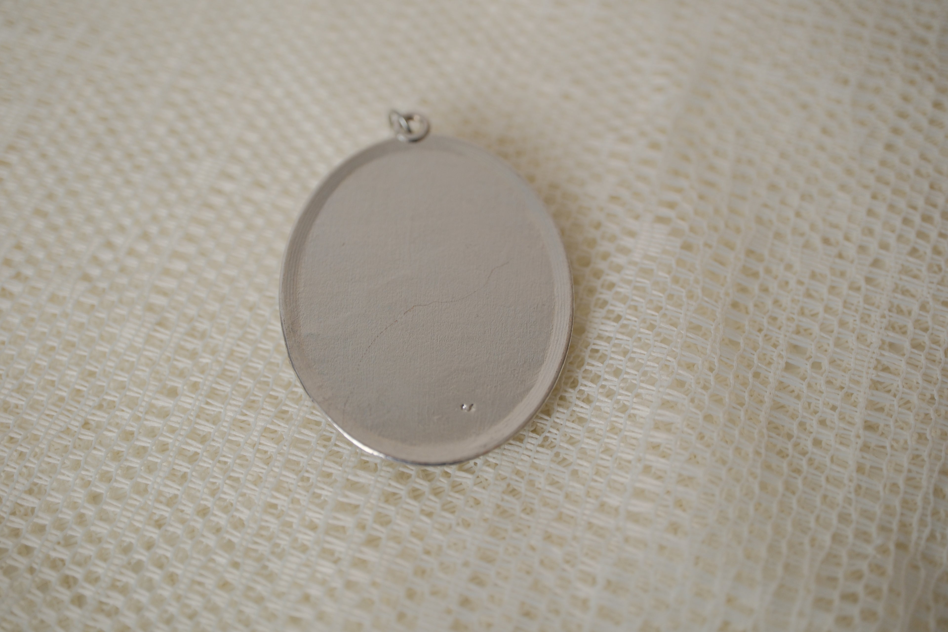 Skeleton cameo pendant