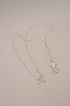 Vintage Avon "Mary Birthstone Angel" necklace