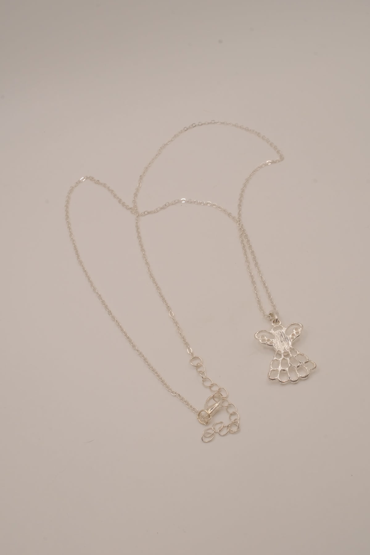 Vintage Avon "Mary Birthstone Angel" necklace