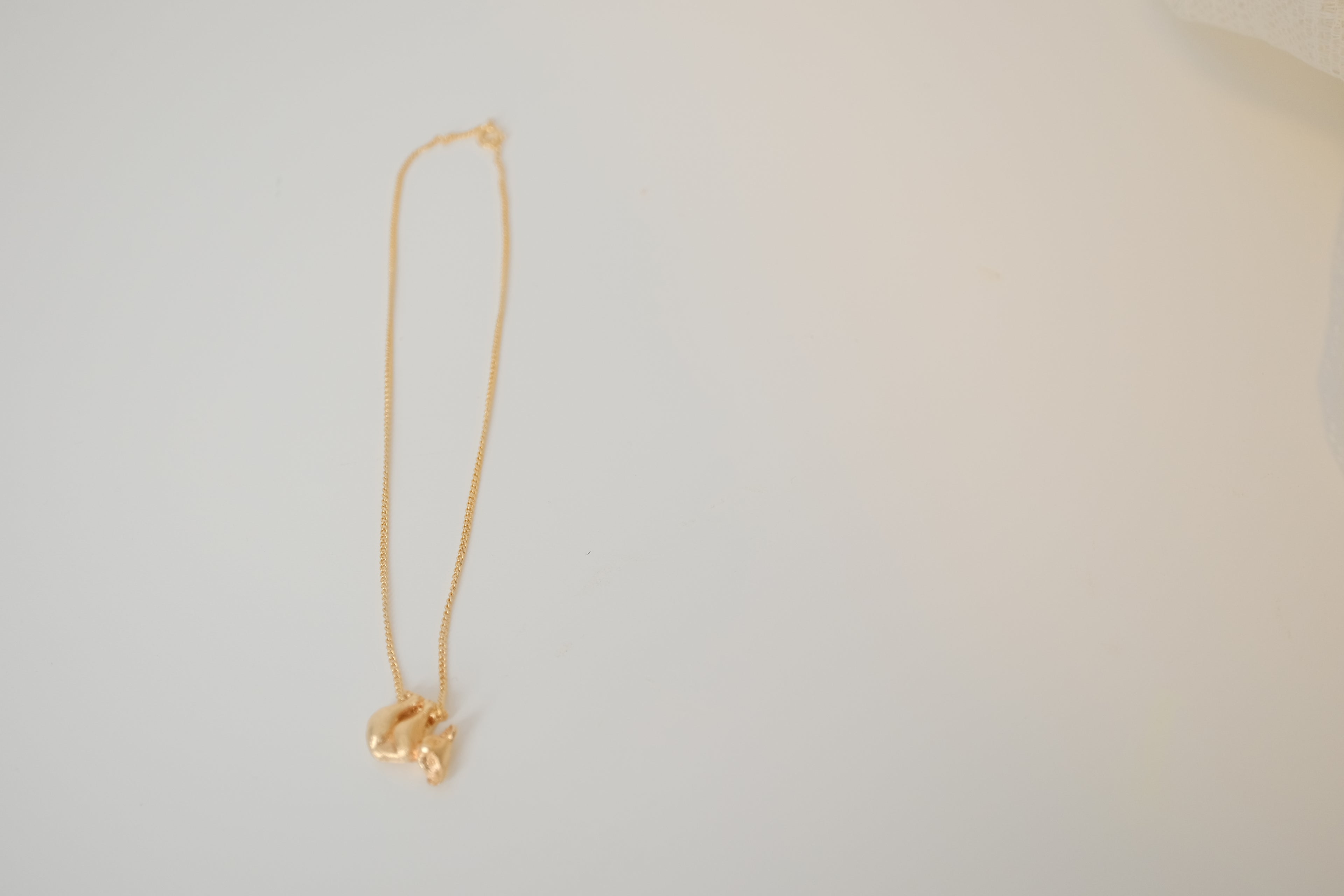 Gold toned Koala near pendant chain