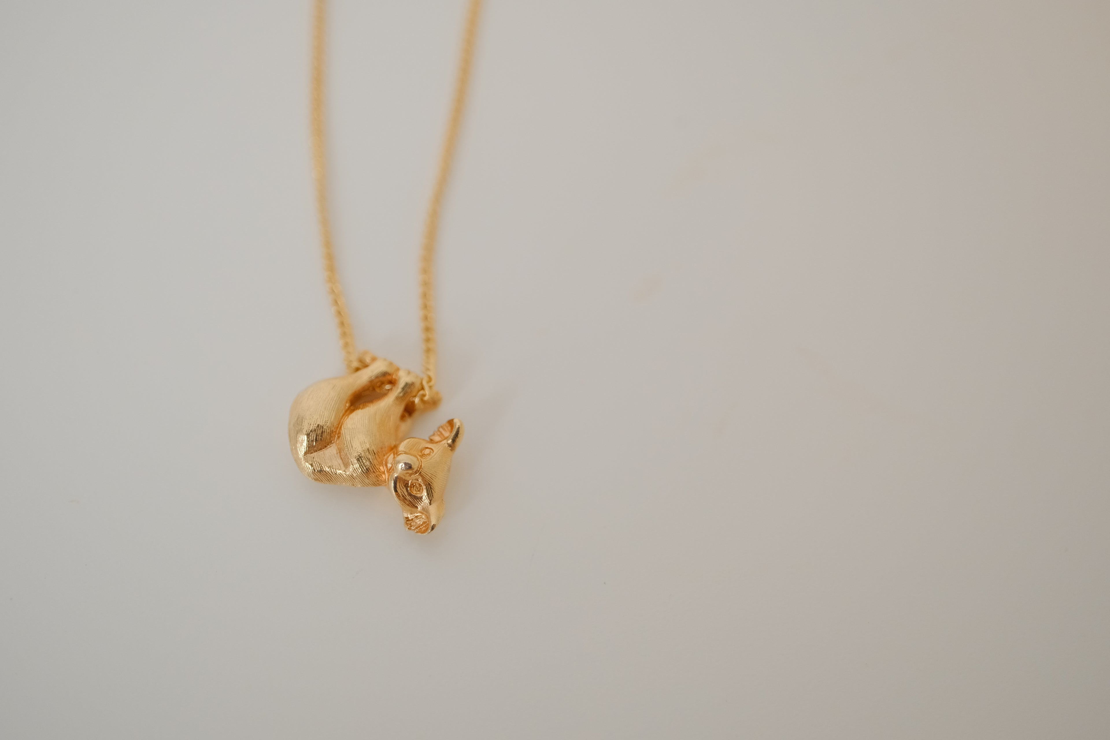 Gold toned Koala near pendant chain
