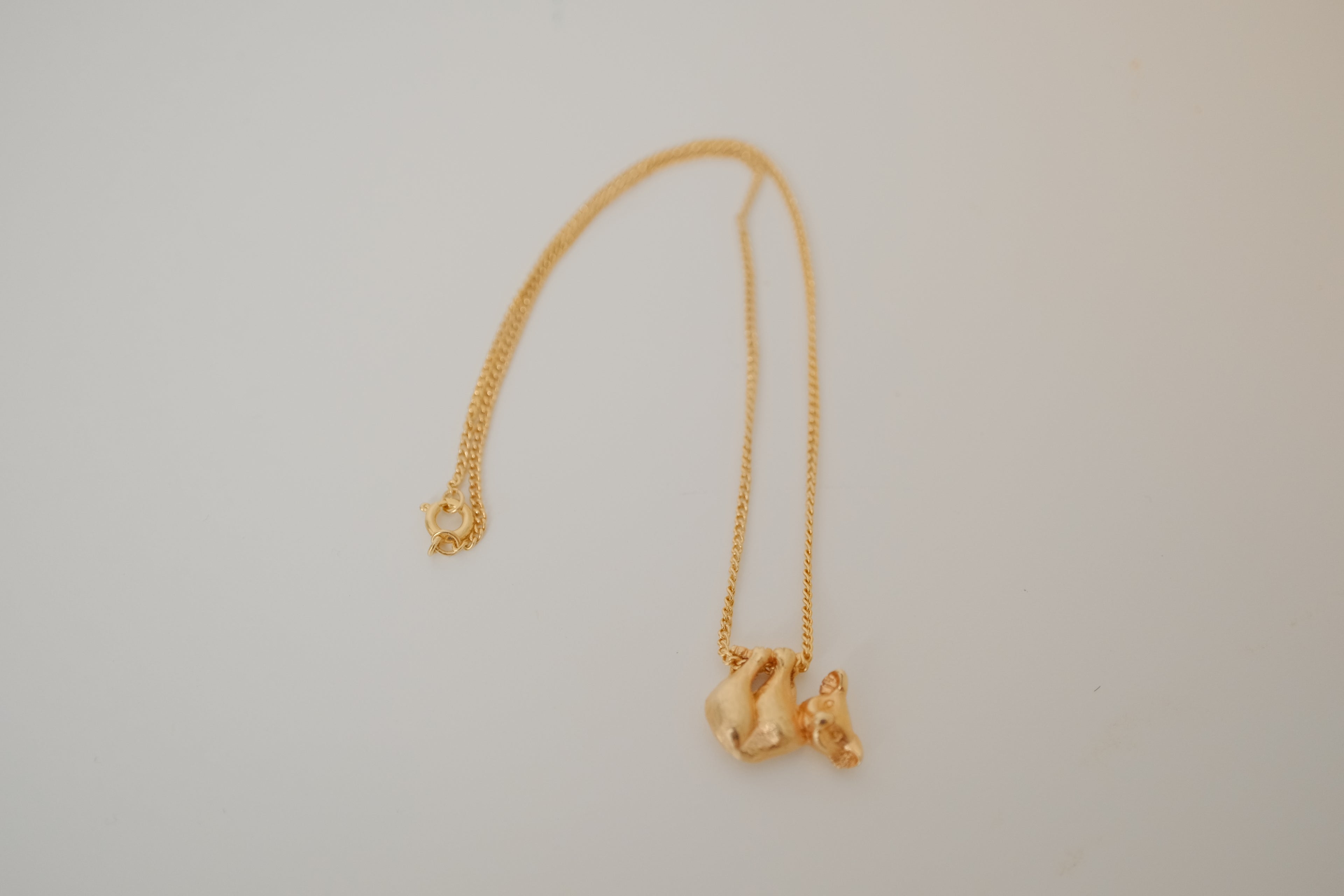 Gold toned Koala near pendant chain