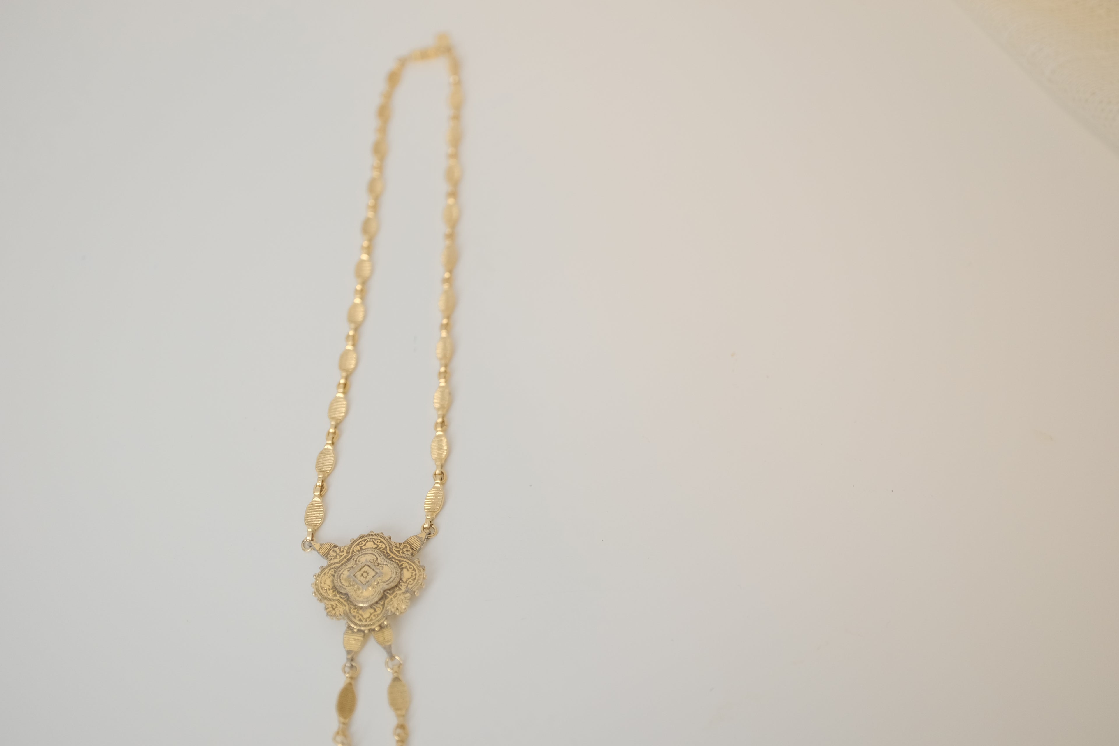 Vintage ornate pendant and tassel drops