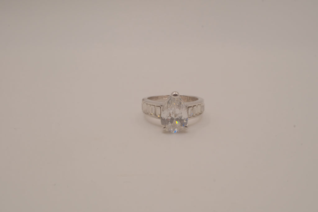 Silver tone pear-cut solitaire ring