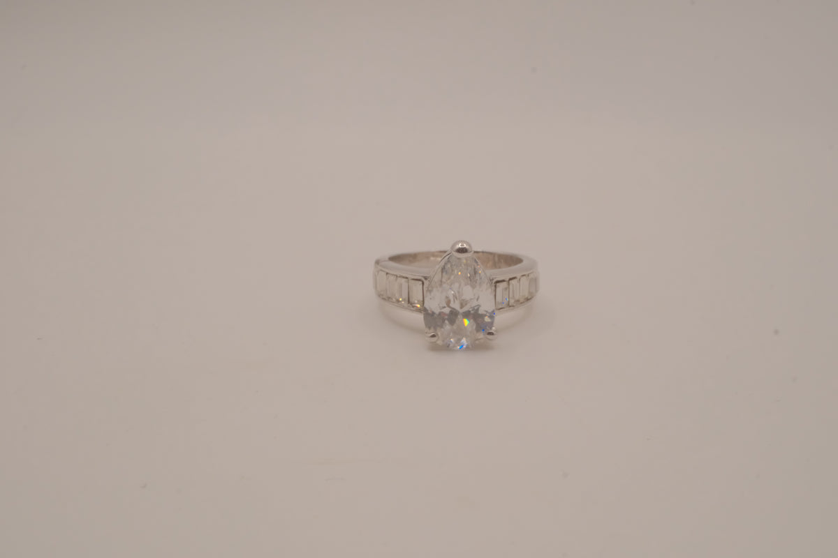 Silver tone pear-cut solitaire ring