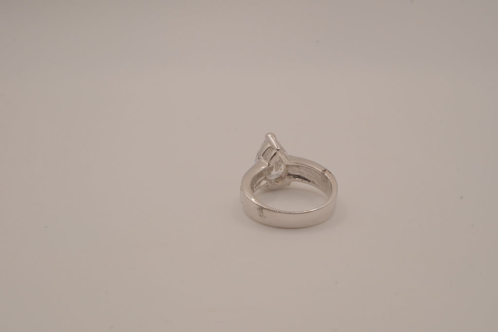 Silver tone pear-cut solitaire ring