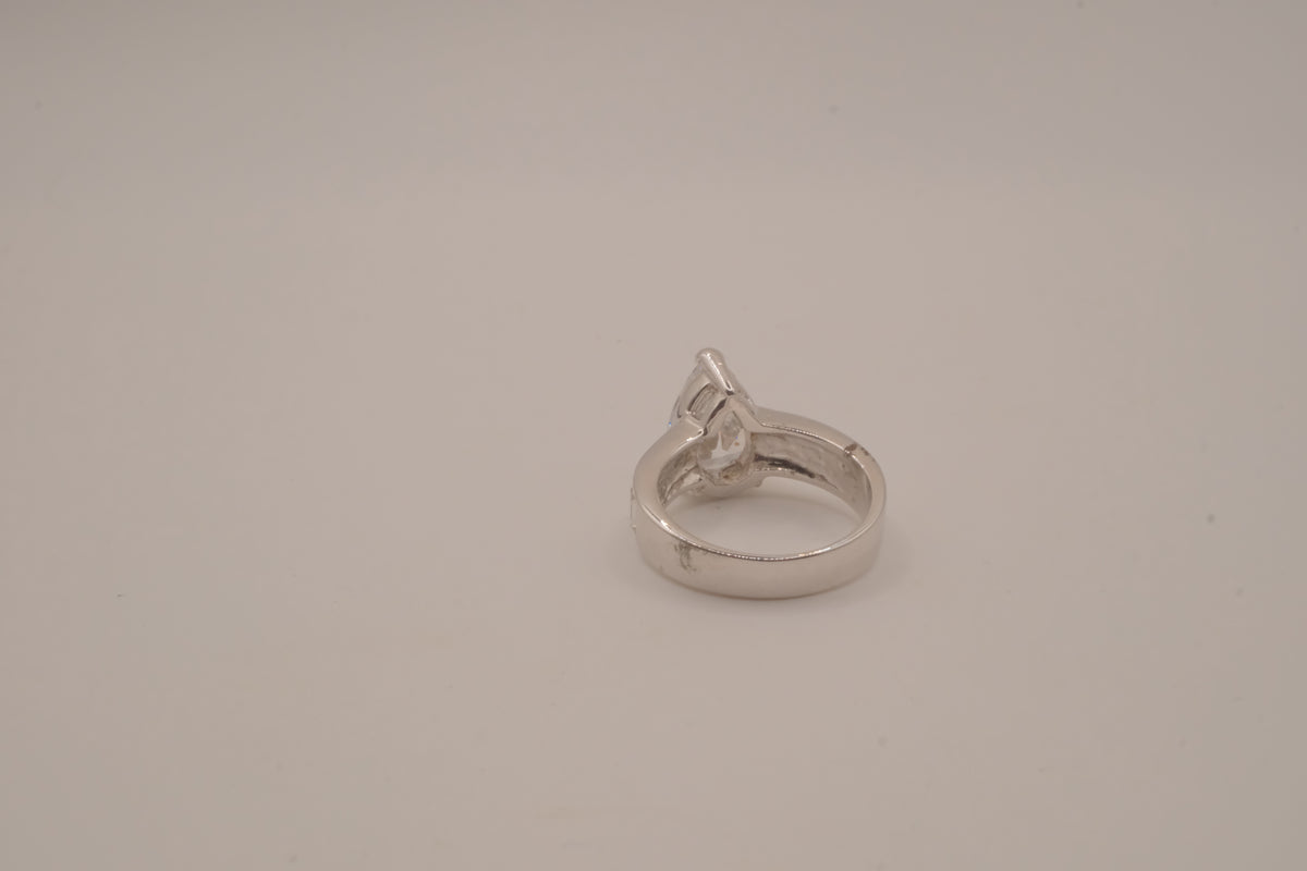 Silver tone pear-cut solitaire ring