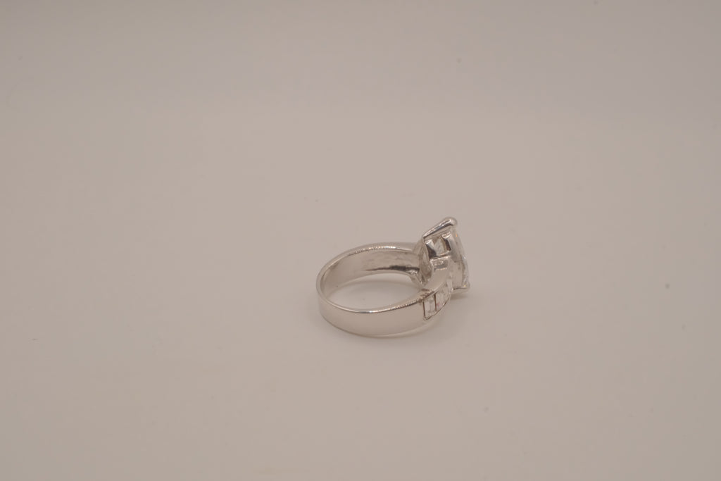 Silver tone pear-cut solitaire ring