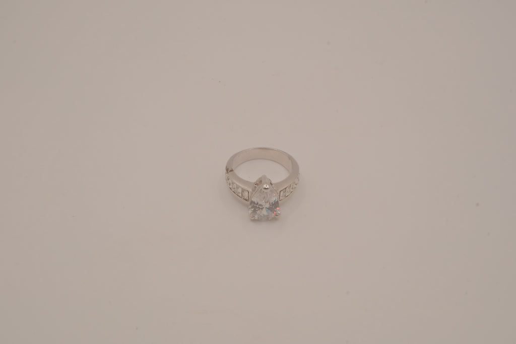 Silver tone pear-cut solitaire ring