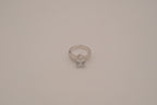 Silver tone pear-cut solitaire ring