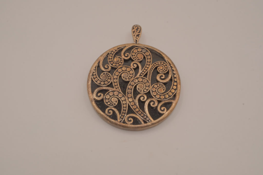 Vintage bronze-tone round pendant