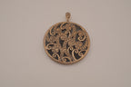Vintage bronze-tone round pendant
