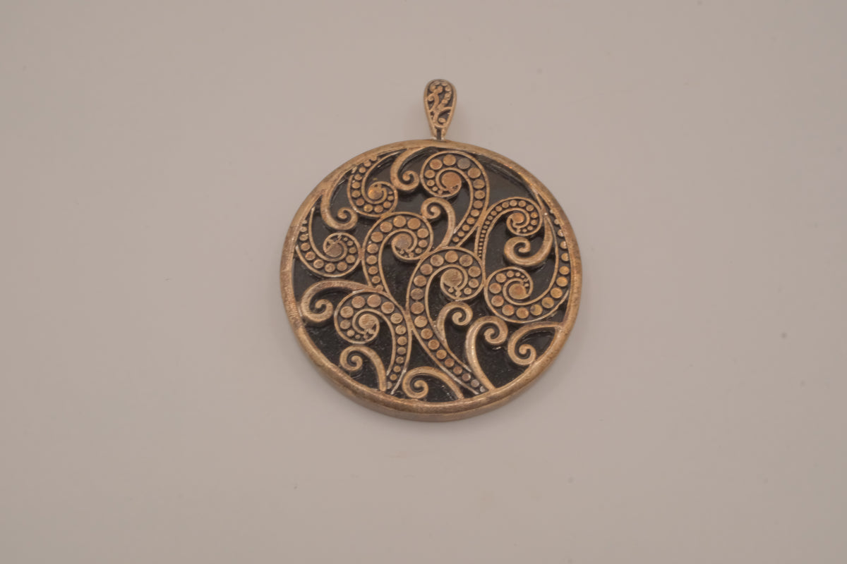 Vintage bronze-tone round pendant