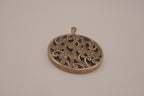 Vintage bronze-tone round pendant