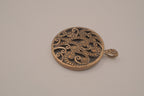 Vintage bronze-tone round pendant